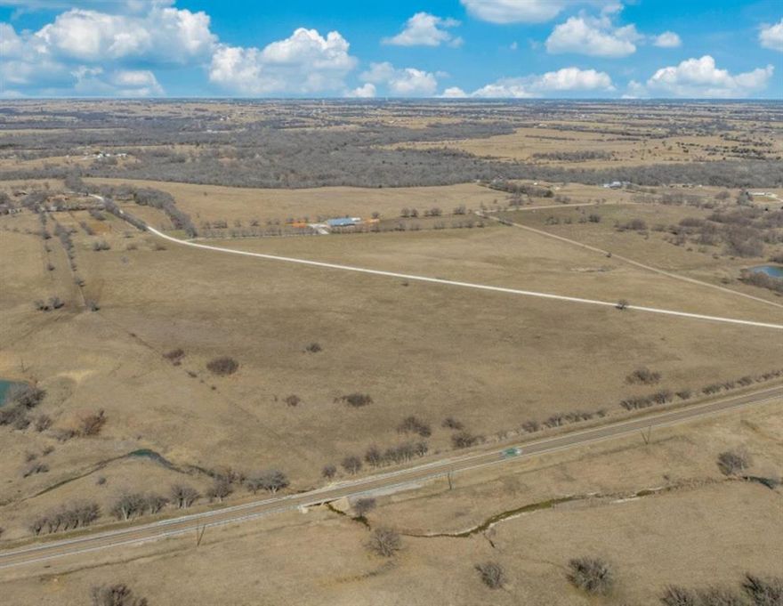 Beautiful 86-acre farm with no floodplain and limitless potential in one of North Texas' fastest growing corridors.
Located outside Sanger City limits and ETJ. 
No Floodplain
2,220' of frontage on Highway 455.
4,000' of frontage on Clear Creek Rd West.
6 inch Bolivar water line along Hwy 455.
Stock pond.
260' Deep water well.
No Oil & Gas surface use. 
Sale includes parcel numbers: R57477, R59158, R57154, R57500, R498455.
Lifetime lease in place on the 1-acre existing homestead.
