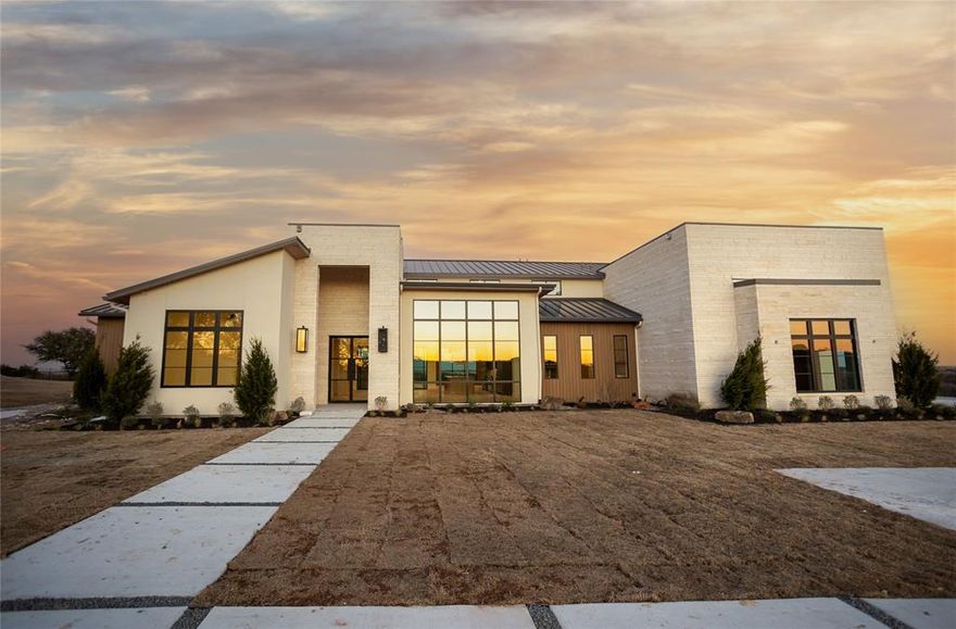 This new construction gem, located in Rancho Ladera, has 5,300 sqft and sits on a sprawling 2.1-acre estate. The quality construction of this 4-bed, 4.5-bath home with 2 living areas impresses. Foam encapsulated with an 11-ton, 18-seer HVAC system, beautiful Marvin windows and doors, and a standing-seam roof enable optimal climate control. Functional features include a 1,000-gallon buried propane tank, a 320-ft deep 17 GPM well, and pre-wiring for a generator.