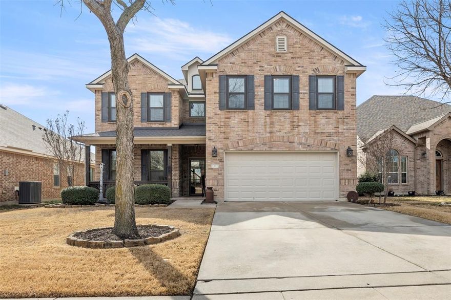 Seller is offering a $10K concession. 

This stunning, light-filled home offers space, style, and an unbeatable layout in a prime Northwest ISD location which is walking distance from the home. From the charming front porch to the bright, airy interior, natural light pours through every corner of both levels. Formal sitting and dining areas create the perfect setting for entertaining, while the kitchen shines with a breakfast bar, center island, and a spacious pantry with built-in shelving.

The main level features a convenient secondary bedroom and full bath, plus laundry just nearby. Upstairs, a versatile loft adds extra living space, and the primary suite is a true retreat with soaring ceilings and a spa-inspired ensuite featuring dual sinks, a soaking tub, and a separate shower. Generously sized secondary bedrooms with cozy carpet complete the upper level.

Enjoy outdoor living on the covered rear patio, plus HOA amenities including a community pool that will only take minutes to walk from the home , playground, and green spaces. Ideally located near schools, minutes from Hwy 114, and within sought-after Northwest ISD—this home checks every box. Schedule your showing today!

Discounted rate options and no lender fee future refinancing may be available for qualified buyers of this home.