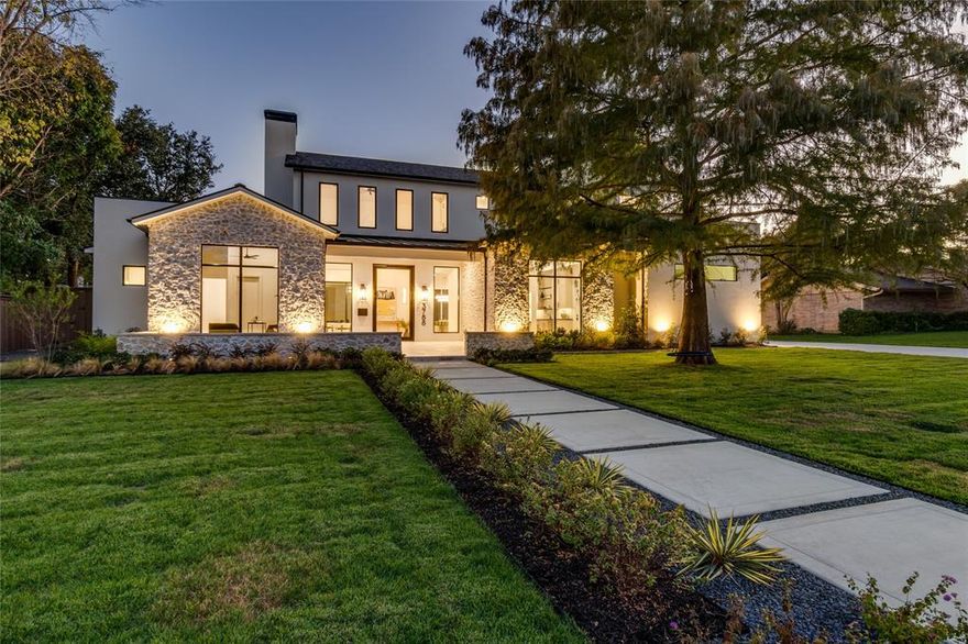 Experience the height of design and craftsmanship with this exceptional new construction by Haus & Co. Homes, ideally located in one of Dallas’s premier neighborhoods just minutes from top-rated private schools. This 5,754 sq. ft. residence is designed with luxury and function in mind.

Step through a striking 5x10 steel pivot front door into an open layout with 12’ ceilings (10’ upstairs), wide-plank 8.5 inch Monarch wood flooring, and 8’ solid-core doors throughout. Vaulted ceilings accent the primary suite, downstairs guest bedroom, and game room. Expansive Quaker aluminum-clad windows and an 18x10 multi-slide glass patio door floods the interior with natural light, while a concealed retractable patio shade and Ayous Thermowood tongue-and-groove ceilings elevate the rear patios.

The gourmet kitchen showcases a Professional Thermador package with 60 inch range and 60 inch refrigerator-freezer, oversized waterfall island, walk-in pantry, wet bar with wine fridge and ice maker, and a large home management desk. Custom soft-close cabinetry throughout adds both beauty and function.

The first-floor primary suite features a spa-inspired bath with dual vanities, makeup area and an expansive custom closet with center island, adjustable shoe racks, and private laundry. A secondary bedroom is also on the main level, while three additional en-suite bedrooms with walk-in closets are upstairs.
Additional highlights include a game room, oversized 3-car garage with attached carport, full foam encapsulation, recirculating tankless water heaters, Trane 20 SEER variable-speed units, and structured wiring. The large backyard offers ample space for a pool with room to spare—an entertainer’s dream blending timeless design with modern efficiency.