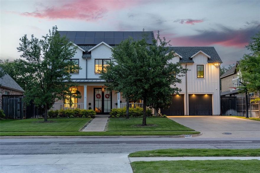 Built in 2019 by Olerio Homes, this five-bedroom, five-bathroom home in sought-after Midway Hollow blends transitional warmth with thoughtful, high-end finishes throughout. A welcoming front porch with gas lanterns sets the tone, creating a warm ambiance before you even step inside. The richly curated, Farrow & Ball–inspired color palette complements extensive millwork, detailed wainscoting, and elegant wood-paneled touches that carry throughout the home. The chef’s kitchen is a true showpiece with a massive island, top-tier appliances, eat-in dining space, and a walk-in pantry large enough to double as prep or storage central. Extensive upgraded lighting from Visual Comfort adds designer flair in every room. The first floor features the primary suite with a spa-like bath and boutique-style walk-in closet, plus a full guest suite and dedicated office — all thoughtfully arranged to maximize flow and privacy. Upstairs offers three additional en-suite bedrooms and a large game room perfect for everyday living or entertaining. Energy efficiency takes center stage with two Tesla Powerwalls, dual EV chargers, and solar panels that produced over 20 MWh in 2024 — nearly eliminating electricity bills for a standard household. The backyard is an extension of the home’s open layout, fully turfed and designed for versatility with an outdoor gas fireplace, built-in gas fire pit, electronic patio screens, and covered space ready for gatherings year-round. A two-car garage completes the home, all set on a quiet, tree-lined street in the heart of vibrant Midway Hollow.