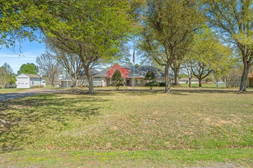 Beautifully maintained home on 1.5 acres in Canton, TX, offering space, functionality, and peaceful surroundings. Built in 1998, this 3-bedroom, 2.5-bath home features approximately 2,950 square feet with a spacious layout and thoughtful updates throughout. The interior has been freshly painted and showcases new flooring, giving the home a clean, move-in ready feel.

Enjoy the comfort of a well-maintained property with major systems already addressed, including an AC unit replaced just 3 years ago and two water heaters to efficiently serve the home’s size.

Outside, the property truly shines with mature trees providing shade and beauty across the lot. In addition to the attached 2-car garage, you’ll find a 2-car detached garage and an impressive 1,000 sq ft workshop—perfect for hobbies, storage, or a home-based business.

This property offers the ideal blend of country living with practical amenities and plenty of room to spread out.