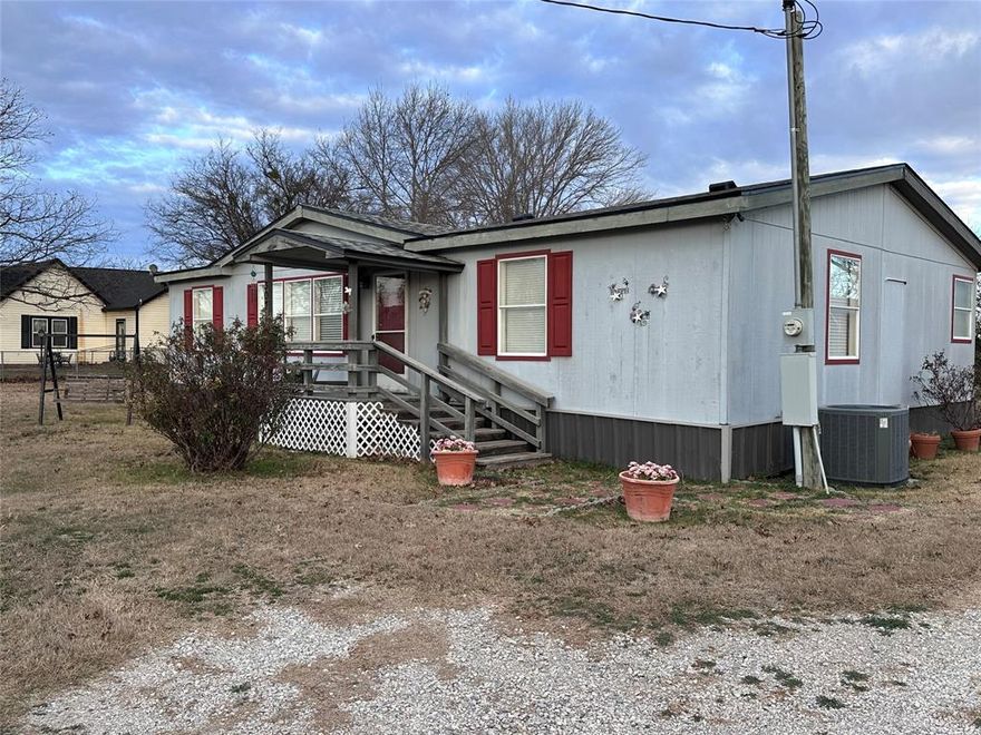 Located within the city of Graford, this well-loved 3-bedroom, 2-bath mobile home sits on approximately .171 acres and reflects the strong local roots and small-town character that define the community. Just a short walk to Graford ISD, the location offers everyday convenience for families, staff, or anyone connected to the school district.

The home has been cared for over the years and offers a functional layout with comfortable living space, making it a solid option for a primary residence or affordable housing opportunity. The manageable lot provides room to enjoy outdoor living while remaining easy to maintain.

Whether you’re looking for a place to put down roots, stay close to local schools, or invest in a home within an established community, this property offers a rare chance to own in a town known for its pride, history, and close-knit atmosphere.