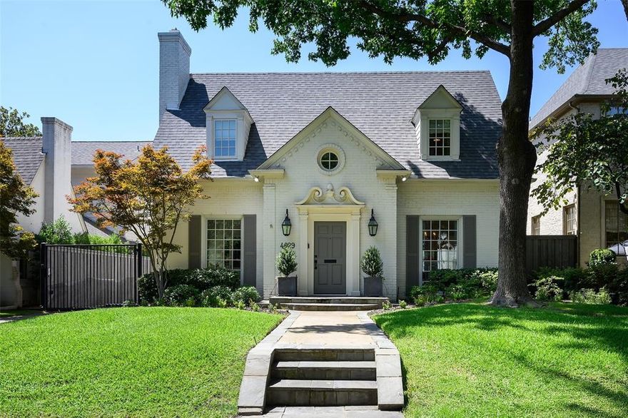 Nestled in the sought-after University Park and zoned for University Park Elementary, 4029 Purdue presents a spacious 4-bedroom, 4.1-bathroom home spanning 3,758 square feet. Upon entry, you're greeted by a formal dining room and a formal living room featuring a gas fireplace, all accentuated by custom window treatments throughout the home. Adjacent is a private study with built-ins, offering a perfect space for work or reflection.

The light and bright culinary kitchen with breakfast area has been updated with marble appointments, stainless appliances, including a four burner gas range with an oven, a separate wall oven, built-in coffee bar, custom cabinetry and a walk-in pantry. The kitchen flows effortlessly into the gracious family room with coffered ceilings, built-ins, a gas fireplace, and windows that frame views of the screened-in porch and turfed backyard.

The first floor is complete with an ensuite guest bedroom with a walk-in closet and powder bath with designer wallpaper. Upstairs, the primary suite acts as a tranquil retreat, complete with a sitting area, walk-in closet, and a luxurious bath offering a spacious shower and garden tub. Additionally, the upper level includes two more ensuite bedrooms with walk-in closets, a game room with closet space for ample storage, and a utility room equipped for full-size laundry appliances.

Designed for relaxation and entertainment, the outdoor patio is screened with sitting and dining areas, a built-in Sedona grill, and a Lynx pizza oven. The turfed yard and a side driveway with an electric gate lead to a 2-car detached garage.

This charming home blends classic elegance with modern updates in a prime location.