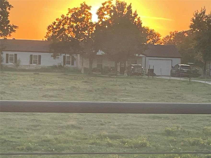 Hard-to-find 4+ acre ranchette with FM 1385 frontage in the path of growth just minutes away from the Dallas North Tollway.  This property offers both comfortable country living now and compelling long-term residential or commercial investment opportunities as development continues along the 1385 and 380 corridor. The inviting one-story home features a cozy fireplace, generous living, kitchen, and dining space, and a practical layout that works well for everyday living or a weekend escape.

Outside, the land is fenced and cross-fenced, featuring multiple usable pastures that are ideal for horses, cattle, or other FFA AG projects.  There is a livestock pond on the back of the property and a large barn and loafing shed in the pasture.  The property is AG-exempt, which provides a great opportunity to save on taxes.  Covered parking is provided by an attached garage and a 2-car carport offering great protection for trucks, trailers, or equipment. Follow the property toward the back, and you’ll find a beautiful, scenic area with big-sky views and a pond, a perfect spot for morning coffee, sunset watching, or future outdoor living. With shared well water, septic, no HOA, and rare FM 1385 frontage, this is a versatile offering: enjoy the relaxed country lifestyle today while holding a 4+ acre asset in a high growth corridor for the future. Storm windows, new roof, new AC, recently remodeled, pecan trees and blackberry bushes.

Buyer to verify all uses, zoning, and exemptions.