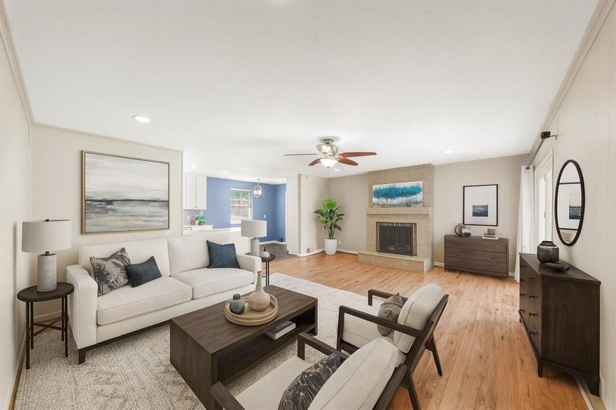 FABULOUS Updated Single Story move-in ready home in the White Rock Hills of Dallas. Located on a charming street in an established neighborhood with mature trees & NO HOA. The cute curb appeal & inviting covered front porch say 'Welcome Home'! Inside you will find a large living room featuring a floor to ceiling gas fireplace. This open concept floorplan with the flow of the kitchen to the living room is perfect for entertaining. The kitchen features granite quartz countertops, stylish penny-tile backsplash, stainless steel appliances including a GAS range, eat-in area, and extra built-in cabinets that make for a great pantry space. Stunning wood floors throughout majority of the home - and no carpet - making for easy-care! Updated vinyl windows throughout the home! Huge stacked formal dining room & living room with bump-out bay window allowing for lots of natural light. Large primary suite with dual closets and updated spa-inspired ensuite bathroom with oversized frameless glass shower & elegant soaker tub. Secondary bedrooms are generously sized & share an updated bathroom with frameless glass walk-in shower. Additional half bathroom is great for visitors. Oversized 2-car garage with extra room that would male for a great workshop space. 3-car wide driveway for additional parking. Large backyard that is ready for pets or play time. Existing concrete slab with potential for future storage shed. Prime location - 9 houses down the street from Lakeland Hills Park - featuring playground, tennis courts, and a new dog park! Don't miss out on this amazing opportunity!