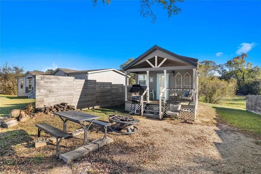 Photo of 339 Indian Gap, Quitman, TX 75783 (MLS # 21280001)