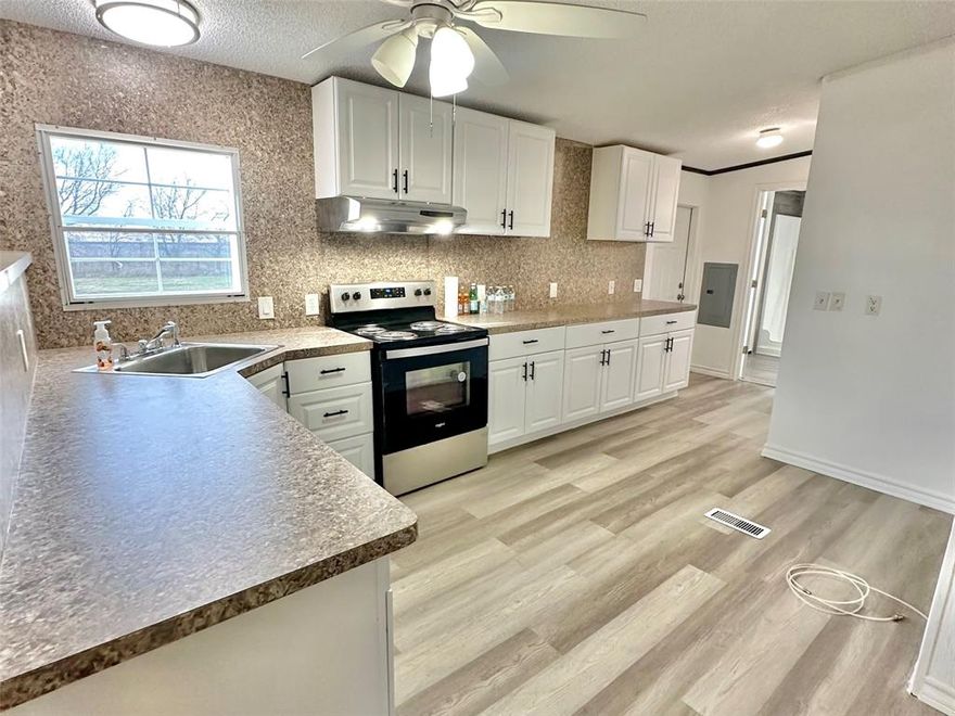 Price Droped! Charming double wide sits on 1.34 acres nested in Krum rapid growing city, minutes away from Denton and Fort Worth. This home is minutes away from major highways, making it easy to reach shopping, dinning, Texas motor speed way , buc-cees , and lots of entertainment to choose from. Enjoy relaxing in your country lifestyle home gather with friends and family in the spacious backyard perfect for entertainment