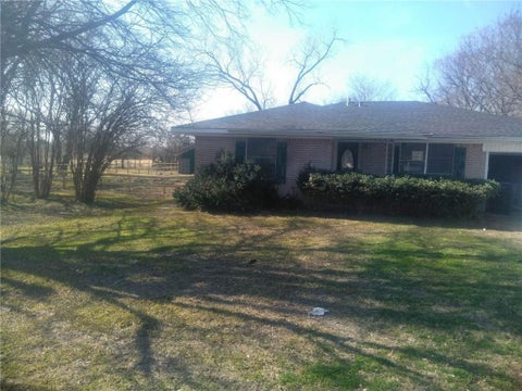 Photo of 1211 Wolfe City Drive, Greenville, TX 75401 (MLS # 21364672)