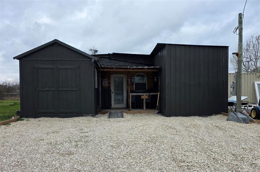 Cozy 2 bedroom 1 bath home with unique rustic charm situated on a corner lot outside the city limits in Whitney, TX. This property is conveniently located close to town and Lake Whitney. There is an additional room or storage in the back that you can add electric to and it can be easily converted to a mancave, she shed or whatever you desire.