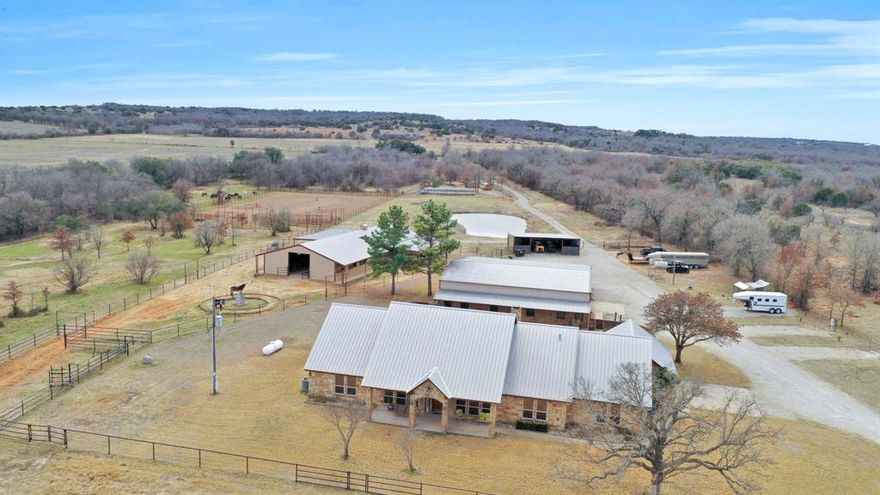Stunning Luxury Turnkey Horse Ranch On 157.066 Acres. This Extraordinary Breathtaking Texas Ranch Offers The Ultimate Blend Of Luxury, Comfort, & Functionality. This Estate Offers A Premier Lifestyle For Both Equestrian Enthusiasts & Those Seeking Luxury Living In A Tranquil Setting. Custom Built Home With Beautifully Crafted Living Space With Rock Detail That Blends Comfort & Elegance, Offering Spacious Living Areas & Exquisite Attention To Detail Throughout with 4 Bedrooms & 3 Bathrooms & a Home Office. The Second Residence; Pool House Offers An Additional Residence For Family, Guests Or Staff, Offering Both Comfort & Privacy with an Open Concept Floor Plan for Versatility, With A Luxurious Home Theater Room Complete With Plush Seating For An Immersive Cinematic Experience. A Spacious, Insulated Heated Horse Barn With 12 Stalls, Tack Room, Feed Room, & Wash Rack. Alongside A Horse Walker For Optimal Care & Exercise. Pipe Arena Is Approximately 300 Ft X 170 Ft With Return Alley & Pipe Pens. 3 RV;Horse Trailer Plugs With Water At The Hookup. Lush Coastal Fields Are Fully Fenced & Cross-Fenced, With 9 Stock Tanks & 2 Water Wells To Support The Needs Of Your Livestock. Additional Outbuildings, Including A Large Shop, Provide Ample Space For Equipment, Storage & Workspaces For Farming, Ranching, Or Hobby Purposes Ensuring That Everything You Need Is Easily Accessible & Protected From The Elements. Outdoor Living Space to Entertain Guests With Plenty Of Space Around The Pool, With An Outdoor Kitchen, Stunning Pool With Waterfall Features, Hot Tub, & The Expansive Pool House Is Ideal For Entertaining Guests. Enjoy The Serene Natural Beauty Of Your Surroundings, With Meticulously Manicured Grounds Perfect For Relaxing Or Hosting Large Events. The Ranch Provides An Idyllic Escape With Ample Space For Both Recreational & Professional Pursuits. This Is An Extraordinary Property That Offers The Best In Country Living With Top-Tier Equestrian Facilities & Luxurious Amenities.