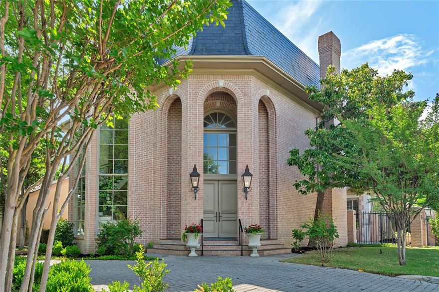 Welcome to 4733 Harley Avenue, a stunning French-inspired, custom-built two-story residence ideally situated just two minutes from Rivercrest Country Club and six minutes from the Cultural District. This exceptional home offers a remarkable blend of elegance, scale, and functionality, featuring 3 bedrooms, 5 bathrooms, and expansive living and entertainment areas. Thoughtfully designed for both grand-scale entertaining and refined everyday living, the residence delivers timeless style with exceptional versatility. Upon entry, you are immediately greeted by a magnificent crystal chandelier that sets the tone for the home’s sophisticated interior. Soaring ceilings, beautiful marble flooring, and rich hardwoods create an atmosphere of timeless luxury throughout. A grand staircase with an exquisite metal balustrade serves as a striking architectural centerpiece, while the elevator adds both convenience and accessibility. The thoughtfully designed floor plan offers multiple living and entertaining spaces anchored by a grand fireplace. At the heart of the home, the chef’s kitchen is both elegant and functional, featuring a large island, hand-painted cabinetry, and a bright breakfast area ideal for casual dining. Upstairs, a versatile media room or office provides the perfect space for working from home or unwinding with family. Generously proportioned bedrooms offer comfort and privacy, while the layout also presents the opportunity to add additional bedrooms if desired, allowing the home to adapt beautifully to a variety of lifestyles. Step outside and experience a thoughtfully designed outdoor sanctuary, ideal for entertaining guests or enjoying peaceful evenings at home. Located in a prestigious and highly sought-after area, this property offers luxury living with exceptional proximity to one of Fort Worth’s premier country clubs. This is a rare opportunity to own a remarkable home in an outstanding location.