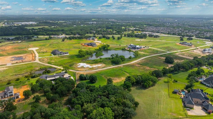 Discover the epitome of luxury living in Bartonville’s exclusive community, Eagle Ridge, where every detail reflects unparalleled elegance. Nestled on expansive 2+ acre homesites, each property offers the perfect canvas to craft your dream home! Embrace a lifestyle enriched by lavish community amenities, such as scenic ponds, ideal for relaxation or recreation. Families will appreciate the prestigious Argyle ISD & Liberty Christian School, ensuring exceptional education opportunities. Indulge in the convenience of nearby dining, including Marty B’s! Golf enthusiasts will relish easy access to premier courses such as Denton Country Club & Lantana Golf Club, while lake lovers can choose between the pristine waters of Lake Lewisville or Lake Grapevine, both just a short drive away. With the option to accommodate horses, this enclave promises a bespoke living experience tailored to discerning tastes. Create your legacy in Bartonville’s most sought-after community! Welcome Home!