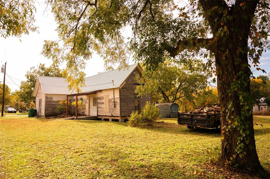 Older home on a double lot a few blocks from the square.  Owner started with foundation work and decided he has too many projects.  Come pour some love into this 1920's home.  Make it your home, a rental or even a STR, build on the double lot, whatever your heart desires!