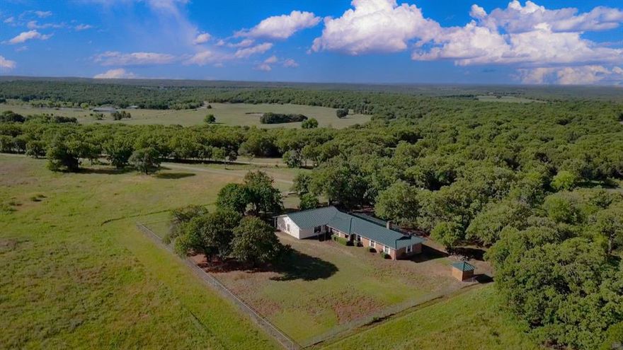 Crooked Creek 20 – Beautiful Acreage, Brick 3 Bed 3 Bath Home, Pond, Generac Generator & More 
This 20-acre Jack County gem offers a great combination of privacy, security, functionality, and natural beauty. The land features heavily rolling topography, native grasses, and full coverage of mature post oak trees throughout.  This property is ready for immediate use as a full-time residence, a hunting or recreational retreat, or a working hobby farm. 
The 2,000 sq ft brick home includes 3 bedrooms and 3 bathrooms, with solid construction and several high-end upgrades. A top-of-the-line Kinetico water softener with macro filter and reverse osmosis system ensures clean, quality water. A Generac whole-home generator with a dedicated 500-gallon propane tank adds backup power security. A storm shelter is also installed on the property.
A small pond stocked with bass and panfish offers casual fishing and draws wildlife. The terrain is ideal for exploring, grazing, or additional improvements. 
Land:
• 20 acres with rolling terrain and native grasses
• Mature post oak trees throughout
• Incredible views and topography
• Stocked pond with bass and panfish
• Private and peaceful setting in Northern Jack County
Improvements:
• Approx. 2,000 sq ft 3 bed3 bath, brick home )
• Oversized 2 car garage
•       Newer HVAC Unit with years remaining on warranty
• Kinetico water system with reverse osmosis
• Generac generator and 500-gal propane tank
• On-site storm shelter
• State-of-the-art security system
• Standing seam metal roof with a long transferable warranty to the new owner
• New Pella Windows and HVAC System
• Electric entrance
Terms:
• Owner financing available with approved credit and financials
• Flexible and ultra-competitive terms
• Acreage amount is flexible, ranging from 20-50 acres