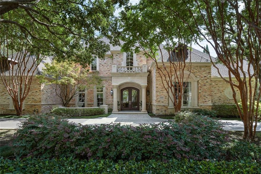 This Preston Hollow treasure was built by the incomparable Oscar Ponder, who built a legacy of luxury in Preston Hollow.  This masterpiece sits on an oversized .43 acre lot with peace and privacy, professional landscaping, pool, waterfall, oversized patio with fireplace and turfed yard. Oscar Ponder spared no attention to detail and his homes are timeless and elegant, with soaring ceilings, wide open spaces, large room sizes and features that make this perfect for entertaining or family enjoyment. Paneled study, two game rooms, studio, and multiple living spaces offer versatility. The downstairs primary suite includes fireplace, sitting area, gorgeous bath with dressing area & three closets.  The eat-in kitchen is open to a private courtyard. Upstairs are two guest suites, paneled game room, studio or exercise. Do not miss this once in a generation opportunity to own such a special home.