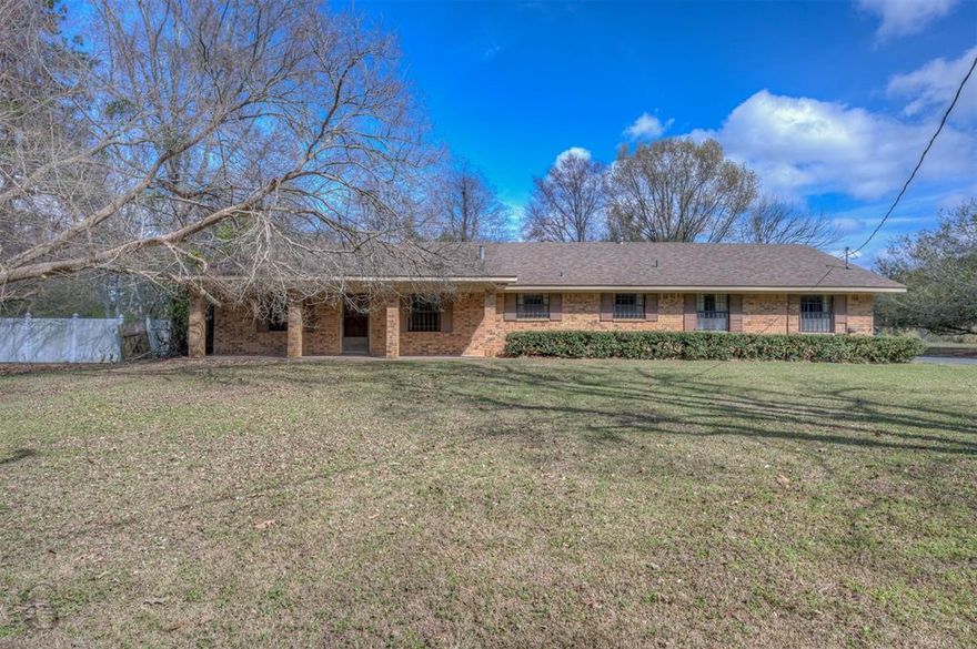 Great home in the heart of Coushatta and near the Golf Course! 2 beds and 2.5 baths with a third room that could be used as an office or bedroom. Drive your golf cart to play golf every day. This home has been well cared for and has great potential!
