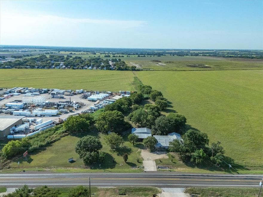 An exceptional opportunity awaits with this 2.04-acre tract situated on a high traffic major thoroughfare just outside of the ever-growing Waxahachie, Tx and offering prime visibility and access in a rapidly developing industrial corridor. The property is surrounded by established industrial and commercial development, making it an ideal candidate for a wide range of future uses. At the heart of the property sits a 1940 built farmhouse, currently in distressed condition and requiring restoration. While the structure is in need of significant work, it presents a unique opportunity for those with vision. With proper renovation, it could potentially be transformed into a character rich office, studio, or other commercial space-preserving history while serving a modern function. The primary value lies in the land itself- flat, useable, and positioned for redevelopment or investment and with great accessibility to a major arterial road and within close proximity of highway 35. Whether you're seeking a location for a new facility, looking to expand, industrial operations, or considering adaptive reuse of the existing structure, this tract offers flexibility and potential. Bring your business and your vision, but do not miss the LOCATION that stands alone for this uniquely situated site. Call listing agent for details.