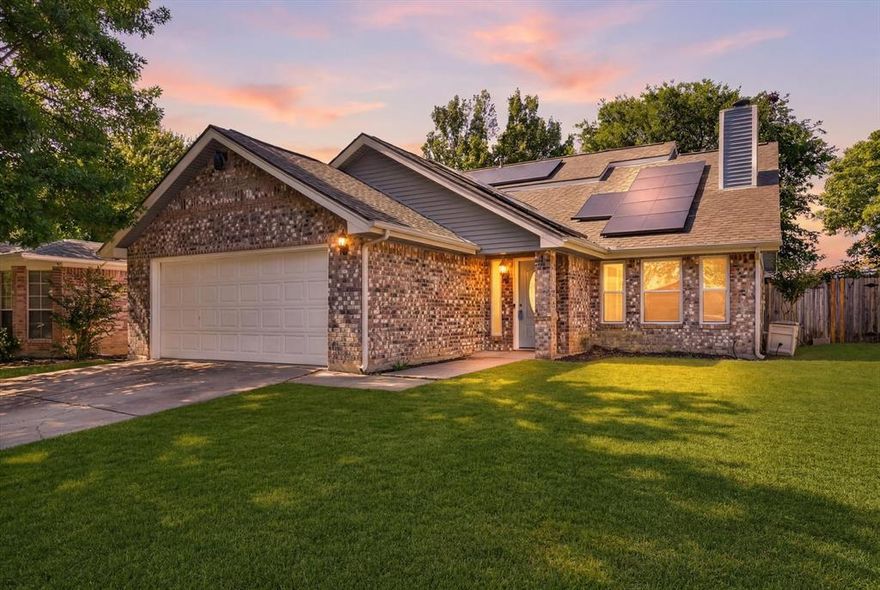 Welcome to this beautifully refreshed two-story home that perfectly blends modern style with high-end energy efficiency. Step inside to discover a bright and airy living room highlighted by soaring vaulted ceilings and updated light fixtures that create an expansive, welcoming atmosphere. The main living areas shine with durable, easy-to-maintain Luxury Vinyl Plank flooring and crisp, fresh interior paint throughout, giving the entire home a clean, modern, and move-in-ready feel. The heart of the home is further enhanced by a newly installed stainless dishwasher, while brand-new carpeting provides ultimate comfort in the bedrooms. Designed with privacy in mind, the highly desirable split floor plan features a spacious first-floor primary suite with a private retreat offering a relaxing tub and separate shower, while the generous secondary bedrooms are located upstairs for fantastic separation. A major standout feature of this property is its incredible efficiency package, including roof-mounted solar panels, a new tankless water heater for endless hot water, and a premium HVAC system heavily upgraded with a larger, high-capacity heat pump in the summer of 2023. Located within the highly regarded Eagle Mountain-Saginaw ISD, this charming home combines a smart layout, stylish fresh updates, and highly valuable energy-saving upgrades—schedule your private tour today!