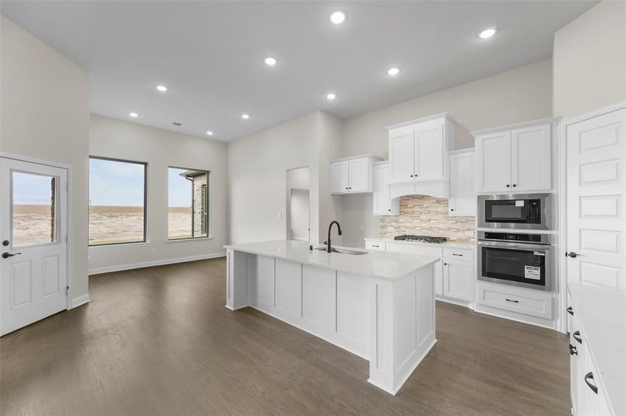 If your current home feels tight, crowded, or no longer fits your lifestyle, this is the upgrade you’ve been waiting for.

Located at 140 Lila Lake Drive, this 5-bedroom, 5-bathroom home was designed for buyers who need real space, not just extra rooms. From the moment you walk in, the scale of the home is clear. The main living area opens up to create a true central gathering space, giving you the freedom to host, relax, and live comfortably without feeling confined.

The kitchen is positioned to keep everyone connected while still offering the functionality needed for everyday living and entertaining. Whether it’s weeknight dinners, weekend hosting, or simply having enough room to move without bumping into each other, this space delivers.

Each bedroom is generously sized and thoughtfully placed to provide privacy and separation, making this home ideal for multi-generational living, growing families, or buyers who need dedicated work-from-home space. This is the kind of layout that allows everyone to coexist comfortably without sacrificing personal space.

For buyers relocating to DFW or moving up from a smaller home, this property solves one of the biggest challenges in today’s market, finding a home that truly feels like a step forward in both space and functionality.

Homes that offer this level of size, layout, and flexibility are becoming harder to find, especially for buyers who need a home that adapts to their lifestyle instead of limiting it.

If you’ve been searching for a home that finally gives you room to breathe, room to grow, and room to live the way you want, this is one you need to experience in person. Schedule your showing and see what makes this home different.