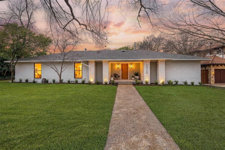 Welcome to 13723 Hughes Lane, located in the sought-after Northwood Terrace. This beautifully remained single story home by Maverick Design is nestled on a quiet, tree-lined street just half a mile from the prestigious Northwood Country Club. Windows, skylights and sliding doors bring the lush landscaping and outdoor feel into the home. This home showcases a well-executed floor plan featuring four bedrooms, three and half baths, open concept floor plan, modern touches, wood flooring, a second living and a three-car garage. The expansive living area is bathed in natural light, anchored by a modern fireplace that adds both warmth and architectural flair. The eat-in kitchen boasts a 48-inch stainless steel gas range, quartz countertops, custom range hood, stainless steel appliances, and plentiful cabinetry. A generous island makes hosting effortless, while the adjacent dining area offers a bright, comfortable area featuring a built in buffet. The second living space sits at the rear of the home is an ideal spot for peaceful mornings or unwinding in the evening and features oversized light filled doors that lead to a welcoming backyard with a privacy fence. Privately situated on its own side of the home, the primary suite serves as a serene retreat. The oversized room features natural light and direct access to the backyard. The primary spa-inspired bath offers dual sinks, an oversized walk-in shower with dual shower heads, a hollywood tub, and two walk-in closets. Three additional bedrooms sit on the opposite side of the home with two of the bedrooms offering a dual connecting bath and the fourth bedroom features its own ensuite bath, making exceptional flexibility perfect for family, guests, a home office, or gym. A well-planned laundry room located just off the kitchen adds everyday convenience. Conveniently located near Preston Road, I-635, Dallas Tollway and close to shopping and dinning. Don’t miss your opportunity to make it yours schedule a private showing today