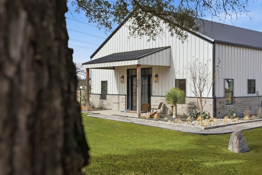 Discover contemporary living in this 3 bed, 2 bath barndominium on 4± acres, featuring a serene 1-acre pond. The sleek living area offers comfort and style, adjacent to a modern kitchen. The master suite boasts an elegant en-suite bathroom with an awesome walk in closet featuring a stackable washer and dryer. A second bedroom and bathroom downstairs, as well as, an upstairs flex room that could be used as a bedroom, office or an additional living area give a great space for kids or guests. Additionally, enjoy the convenience of a 1200 square foot fully climate-controlled shop space with its own AC unit. The property is serviced by a water well and features an irrigation system, enhancing its lush surroundings and ensuring efficient maintenance. Embrace modern comforts and tranquil countryside living in this unique retreat.