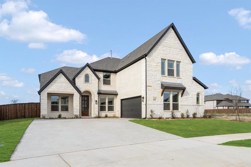 NEW! NEVER LIVED IN. Ready Now. This Spring Cress II by Bloomfield Homes delivers big presence and smart design on an oversized lot in Wildflower Ranch. From the street, the upgraded white brick and stone exterior, fully bricked front porch, onyx-stained garage door, and upgraded 8' front door immediately set this home apart. Once indoors, site-stained wood floors lead you through the main living spaces and pair seamlessly with upgraded tile in every bathroom for a cohesive, elevated finish throughout. The layout flows comfortably from the Family Room into the Dining space and Deluxe Kitchen, where practical upgrades shine with pot and pan drawers, a dedicated oven and microwave cabinet, a cooktop below a wood vent hood, and a large central island to gather around. Anchoring the space nearby is a dramatic floor-to-ceiling, direct-vent fireplace made of chopped silvermist stone. The first floor is thoughtfully arranged with the Primary Suite tucked away for privacy, a secondary bedroom and full bath featuring a standing shower, and a private Study enclosed with glass French doors that works perfectly for a home office or flex space. Upstairs opens to a spacious Game Room framed by rod-iron railing along the staircase and family overlook, creating a connected yet open feel. A dedicated Media Room adds another layer of flexibility, while 3 additional bedrooms (all with walk-in closets) and a secondary bath with a standing shower complete the second level. Finishing touches include added LED lighting in both the Dining Room and Game Room, rain gutters, a gas drop at the rear patio, and hot and cold hose bibs with a drain at the back of the home, all reinforcing the level of care put into this build. Call or visit the Bloomfield Homes model at Wildflower Ranch in Fort Worth to see this Spring Cress II in person and explore the community!