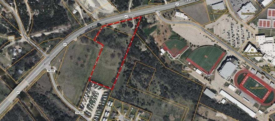 LOCATION LOCATION LOCATION.   Excellent CommercialZoned Property with road frontage on US 67.  Walking distance to schools and sports complex.  At one time this property was zoned Planned Development and with great plans in place.  Opportunities are endless with this raw land.  Commercial. Residential. Multi-Family.