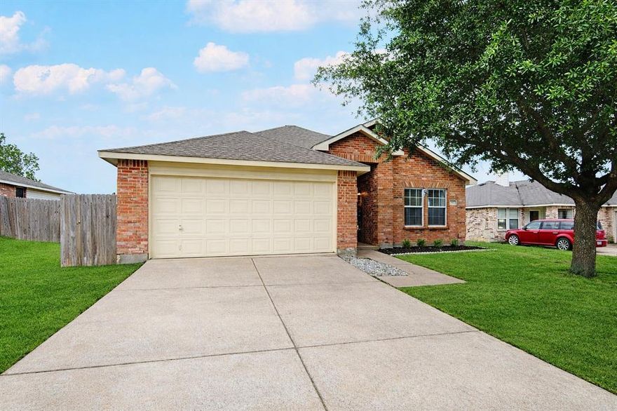 Charming 3-bedroom, 2-bath home with a 2-car garage conveniently located near schools, shopping, and downtown Royse City. This home features an open-concept layout with durable ceramic tile and laminate flooring throughout the main living areas.

The light-filled living room offers a cozy wood-burning fireplace and flows seamlessly into the kitchen, which is equipped with ample cabinet space, a dishwasher, disposal, and range—perfect for everyday living.

All bedrooms include walk-in closets, while the primary suite features dual sinks and a separate shower for added comfort. Additional highlights include a full-size utility room, ceiling fans, and a spacious fenced backyard—ideal for relaxing or entertaining.