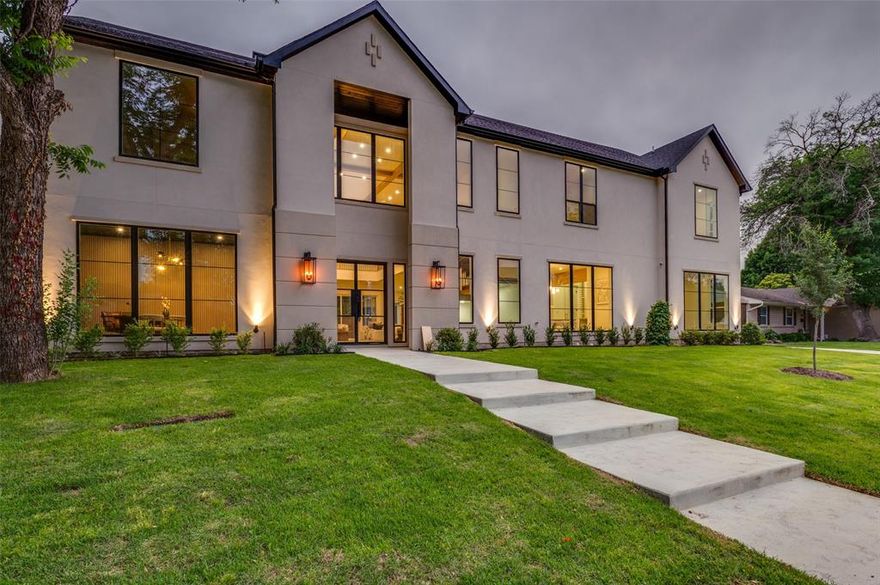 New luxury construction in North Dallas’ prestigious private school corridor with convenient access to North Dallas’ premier dining, luxury shopping, and elite schools. This warm modern residence blends timeless architecture with elevated transitional design to create a home that feels both sophisticated and inviting. Thoughtfully designed with soaring ceilings, expansive windows, designer lighting, solid hardwood floors, custom wall paneling, every space was curated with comfort, functionality, and luxury in mind.

The open-concept layout was designed for both everyday living and effortless entertaining. At the heart of the home, the chef’s kitchen is anchored by a 48 inch Wolf gas range, Thermador appliances, Taj Mahal quartzite countertops, prep kitchen with walk-in pantry, and wine cellar. Privately positioned on the main level, the primary retreat offers a dedicated office, spa-inspired bath, and dual level custom walk-in closets connected by spiral staircase creating a true private wing experience.

Optimized for both daily living and entertaining, the layout showcases a dedicated theater room, game room, two laundry rooms, covered outdoor living area, side-entry 3-car garage, integrated speaker system, smart home pre-wiring, and a 3-zone HVAC system with separate climate control for the primary suite wing, downstairs living areas, and upstairs level.  A premier opportunity to own a thoughtfully designed luxury home in the Midway hollow Sparkman corridor, located just minutes from Dallas North Tollway for an effortless commute.