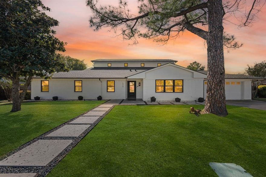 Welcome to this beautiful modernized ranch-style home, perfectly situated on over a third of an acre, in one of the area’s most desirable towns; Roanoke, the Unique Dining Capitol of Texas. Completely Remodeled with new addition in Feb. 2019. This home features 4 bedrooms, 4 bathrooms and combines classic charm with contemporary elegance for the ultimate in comfortable living. Step inside to discover a thoughtfully updated interior with light-filled living spaces and an open-concept layout ideal for entertaining. The large kitchen flows seamlessly into the living and dining areas, making it perfect for both everyday life and special gatherings. Venture outdoors to experience resort-style living at its finest. Host unforgettable get-togethers in the outdoor kitchen, relax in the sparkling heated pool, roast marshmallows in the built in fire-pit, or celebrate in the expansive party barn—ideal for everything from milestone events to casual evenings with friends. Square footage includes the 550 square foot Party Barn. House also has built in LED Christmas lights with multiple color options. Enjoy the convenience of a walkable lifestyle, with popular restaurants and live entertainment just steps from your front door. This property offers the rare combination of modern amenities, generous outdoor living, and unbeatable location—don’t miss the opportunity to make it yours and Ring in the New Year!!