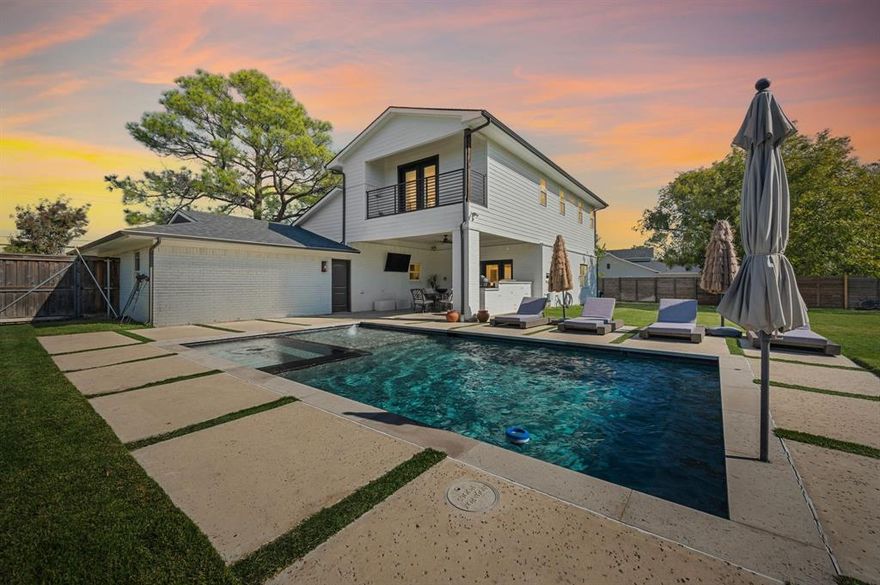 Welcome to this beautiful modernized ranch-style home, perfectly situated on over a third of an acre, in one of the area’s most desirable towns; Roanoke, the Unique Dining Capitol of Texas. Completely Remodeled with new addition in Feb. 2019. This home features 4 bedrooms, 4 bathrooms and combines classic charm with contemporary elegance for the ultimate in comfortable living. Step inside to discover a thoughtfully updated interior with light-filled living spaces and an open-concept layout ideal for entertaining. The large kitchen flows seamlessly into the living and dining areas, making it perfect for both everyday life and special gatherings. Venture outdoors to experience resort-style living at its finest. Host unforgettable get-togethers in the outdoor kitchen, relax in the sparkling heated pool, roast marshmalows in the built in fire-pit, or celebrate in the expansive party barn—ideal for everything from milestone events to casual evenings with friends. The Party barn offers an additional 550 square feet of lounge and entertaining space. House also has built in LED Christmas lights with multiple color options. Enjoy the convenience of a walkable lifestyle, with popular restaurants and live entertainment just steps from your front door. This property offers the rare combination of modern amenities, generous outdoor living, and unbeatable location—don’t miss the opportunity to make it yours just in time for pool season!