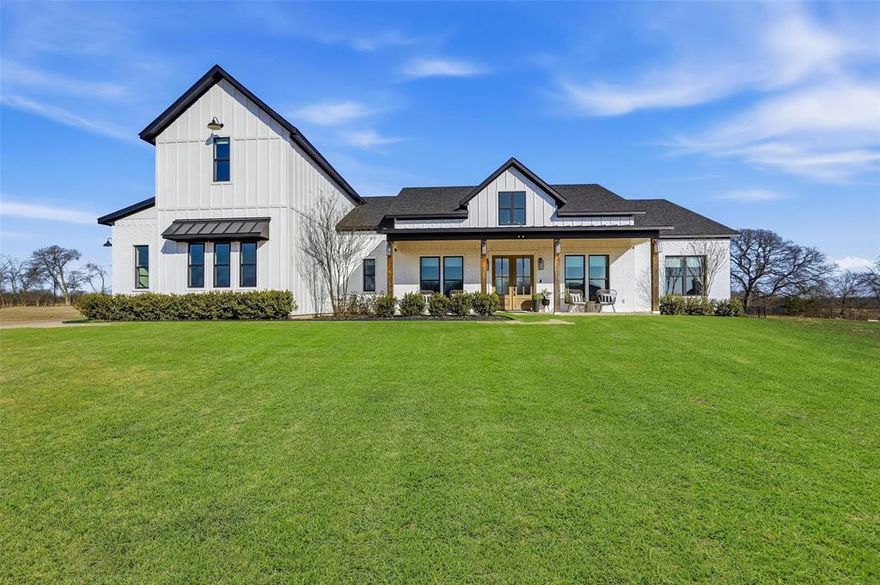 Located in a gated luxury community in North McKinney, this stunning 4 bedroom, 4.5 bath residence blends refined elegance with everyday comfort on a private, tree lined one acre lot. Ideally situated less than 20 minutes from Buc-ee’s and HEB in Melissa, the home offers both serene seclusion and convenient access to premier amenities.
The expansive primary suite is a true retreat, offering abundant natural light, a calming ambiance, and a spa-inspired ensuite with soaking tub, walk-in shower, and elegant finishes. An oversized custom closet features extensive built-ins, smart organization, and an additional storage closet for exceptional functionality.
Designed for entertaining, the home includes a moody, sophisticated wine bar with ample storage for wine, glassware, and bar essentials—perfect for intimate gatherings or quiet evenings at home. Expansive glass sliders line the back of the home, flooding the living spaces with natural light while providing seamless indoor-outdoor flow and scenic views of the private backyard.
Step onto the serene back porch overlooking the peaceful acre lot, framed by mature trees that offer privacy and natural beauty, ideal for relaxing or entertaining year-round. Completing the home is a private upstairs gym, offering a dedicated and versatile space for fitness, yoga, or wellness routines. With generous living spaces, thoughtful design, and rare outdoor privacy, this property delivers exceptional lifestyle living in one of North McKinney’s most desirable gated communities.
Buyer can get a Free 1-0 Rate Buydown with Sellers preferred Lender.