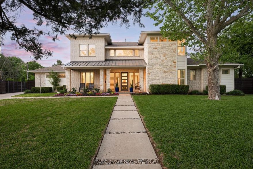 Tucked away on an expansive & rare 0.626-acre pie-shaped lot, this remarkable 5,818 sq. ft. home, built in 2016, blends modern luxury with timeless sophistication. Designed with both comfort & entertaining in mind, the home offers 5 spacious bedrooms, 6 full baths, & 2 half baths—perfect for refined living on any scale. Step inside to discover a thoughtfully curated layout featuring a serene first-floor primary suite & a private guest suite, ideal for hosting or multigenerational living. The living room is the heart of the home, anchored by built-in shelving & a warm gas fireplace, seamlessly flowing into the chef’s kitchen. Outfitted with professional-grade Thermador appliances, including a gas range, double ovens, built-in refrigerator, & a generous walk-in pantry, this kitchen is a dream for everyday meals & gourmet gatherings alike. The butler's pantry with wine cooler connects to the formal dining room, enhancing the home’s effortless flow. A flexible main-level room offers a private exterior entrance & ensuite bath—perfect as a home office, in-law suite, or quiet retreat. Upstairs, wide-plank wood floors lead you to a second living area or game room with its own charming balcony, creating an ideal escape for movie nights or family fun. Each of the three upstairs guest bedrooms includes its own ensuite bath. The three-car garage features durable epoxy flooring, accessed by a private security gate. The expansive backyard is an entertainer’s dream. Enjoy the covered outdoor kitchen & lounge area with fireplace, with plenty of space for a custom pool, pickleball court, or putting green—whatever your vision may be. With integrated smart home technology for lighting & audio, everything is at your fingertips with the touch of an iPad. Ideally located within walking distance of ESD and just minutes from Dallas’ top private schools, fine dining, shopping, and easy access to the Tollway—this one-of-a-kind property delivers exceptional living, function, and location.