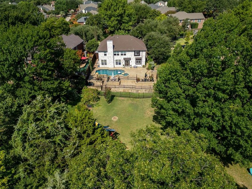 Welcome to 583 Oakbend Drive, situated gracefully in the heart of Coppell, TX. This exquisite single-family home, fully renovated to perfection, spans an impressive 3,178 square feet, offering a blend of comfort and elegance. As you step inside, you are greeted by the rich warmth of hardwood floors that seamlessly flow through the home, while the bedrooms offer the cozy touch of brand-new plush carpeting. 4 spacious bedrooms and 2.5 beautifully appointed bathrooms epitomize luxury living at its finest. Retreat to the oversized primary bedroom and a en-suite bathroom, complete with granite finishes, double sinks, and a large full body shower for a spa-like experience. Custom walk-in closets offer abundant storage for all your needs. The home is bathed in natural light from its northern exposures, enhanced by sophisticated recessed lighting and elegant chandeliers. At the core of this home, the chef's kitchen stands ready to inspire culinary creativity. Outfitted with a stainless-steel Wolf gas range that includes a double oven, this kitchen is a dream for any culinary enthusiast. The built in ice maker, and a wine cooler makes entertaining a breeze. Granite countertops, an island kitchen, warming drawer and with stainless steel sink while providing ample storage space to ensure that every gathering and event is hosted with ease and sophistication. Relax in the living area, where a decorative fireplace serves as a stunning focal point. The allure continues outdoors with a private patio perfect for serene mornings, leading to a heated pool and a massive backyard. The space offers tranquility and recreation, featuring multi-level patio. For your convenience, the home is equipped with laundry facilities on both the first and second floors. This residence at 583 Oakbend Drive is a true gem, presenting luxurious amenities and modern living in a tranquil setting. Your dream home awaits, inviting you to experience comfort and elegance like never before.