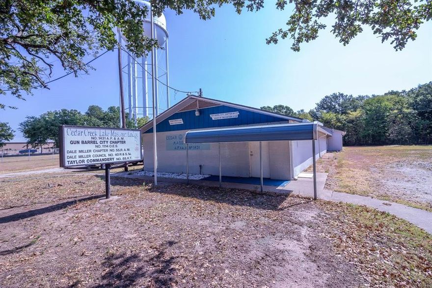 Great investment opportunity!  Commercial property with 4860 SF building on 1 acre of land.  3 huge rooms, 1 kitchen, 2 restrooms, 3 small offices.  Roof is approximately 7 years old & electrical panel was upgraded in 2022.  Plenty of space for parking.  Storage building.  Call today to make your appointment!  Lots of possibilities!