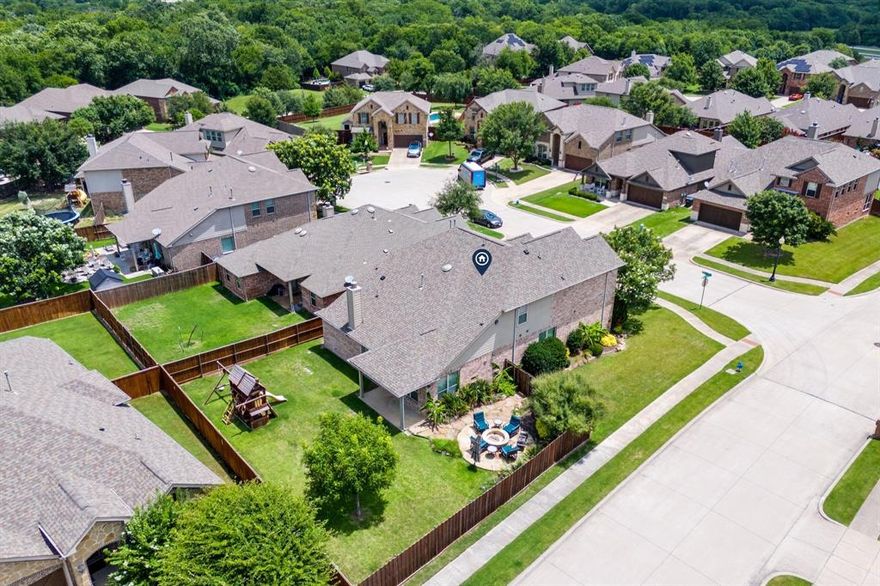 This beautiful corner-lot home is tucked away on a quiet cul-de-sac in McKinney’s sought-after Inwood Hills neighborhood. Filled with natural light and open spaces, the home offers a warm and welcoming feel from the moment you step inside. A two-story foyer opens to a stylish dining room with designer details, while the open-concept kitchen features granite countertops, stainless steel appliances, a gas range, and a large island with a breakfast bar that flows seamlessly into the living area with a cozy fireplace. Just off the kitchen, the breakfast nook leads to a covered patio, perfect for morning coffee or casual outdoor dining.
The primary suite on the main floor provides a peaceful retreat with dual sinks, a soaking tub, a separate shower, and a walk-in closet. A downstairs guest bedroom with a full bath offers flexibility for visitors or a home office. Upstairs, you’ll find a spacious game room, a media room ideal for movie nights, and two additional bedrooms that share a full bath.
The backyard is designed for both entertaining and relaxation, featuring a covered patio and a stone firepit area for enjoying evenings under the Texas stars. Conveniently located near El Dorado Country Club and Bonnie Wenk Park, this home is zoned to top-rated McKinney ISD schools and part of the Inwood Hills community, which includes a pool, playground, and scenic walking paths. 
Home sold as is.