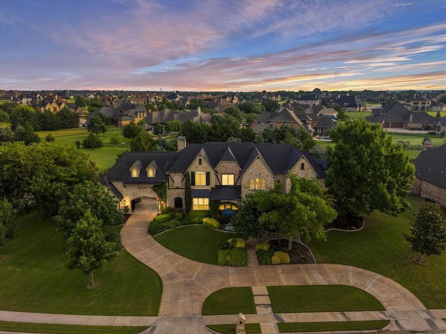 Nestled within a prestigious executive-style gated community, this meticulously crafted 5-bedroom estate offers unparalleled luxury and privacy. A grand two-story office with a hidden door and spiral staircase leads to an upstairs library and exercise room, seamlessly blending functionality and elegance. The open-concept floor plan is adorned with rich hardwood floors throughout, creating a warm and inviting atmosphere. The chef’s kitchen is a culinary masterpiece, featuring top-tier appliances and custom cabinetry, perfect for both everyday meals and grand entertaining. Adjacent to the kitchen, a spacious great room and formal dining area provide ideal spaces for both intimate gatherings and grand entertaining. The main level also boasts a private guest suite, offering comfort and seclusion for visitors. Upstairs, a fully furnished theater room awaits, providing an immersive cinematic experience, while a thoughtfully designed kids' retreat offers a dedicated space for play and creativity. Outside, the resort-style backyard is a true oasis, complete with a large saltwater pool and spa, extensive landscaping, an inground trampoline, and a sport court. Multiple outdoor living areas, including a fully equipped outdoor kitchen welcome year-round enjoyment. The estate is further complemented by a 4-car garage, providing ample space for vehicles and storage.