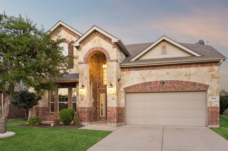 Apply for Frisco ISD with Access Frisco program!! Nestled in the prestigious gated community of The Shores at Hidden Cove, this updated 4-bedroom, 3.5-bathroom home delivers spacious luxury and modern living at its finest. As you step inside, you’re greeted by beautiful hardwood flooring and elegant crown molding throughout the first floor, creating a warm and sophisticated atmosphere. The spacious formal dining room, illuminated by a stunning new modern lighting fixture, is perfect for memorable family gatherings and effortless entertaining. The chef-inspired kitchen shines with brand new stainless steel GE appliances, beautiful granite countertops and new modern pendants above the island. Brand new painted railings and open-concept design flows seamlessly into the family room anchored by a cozy fireplace. The master suite provides a garden tub, stand up shower and walk in closet. Flex room downstairs which can be a dedicated office or a guest suite with a full bath. Spacious Game Room and Media Room upstairs plus two bedrooms. Throughout the home, you’ll enjoy brand new luxury ceiling fans. EV charger in the garage can come with the home! Residents also enjoy quick access to the community’s sparkling pool, playground, and scenic pond. Just moments away, Lake Lewisville beckons with boating, fishing, camping and more!