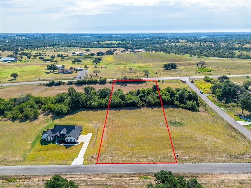 Build Your Dream Home in Greyhound Landing
Discover the perfect blend of privacy and convenience on this beautiful just over two acre lot in the sought after new subdivision of Greyhound Landing. Surrounded by mature trees, this property offers a serene, park like setting while still being just minutes from town. Located within the highly rated Peaster ISD, it’s ideal for those seeking both a peaceful lifestyle and quick access to schools, shopping, and dining. Multiple lots are available, and you even have the option to purchase the adjoining lot to double your space and expand your vision. With plenty of room for your custom home, outdoor living areas, and more, you can create the retreat you’ve always envisioned. Don’t miss the opportunity to own land in one of the area’s most desirable communities