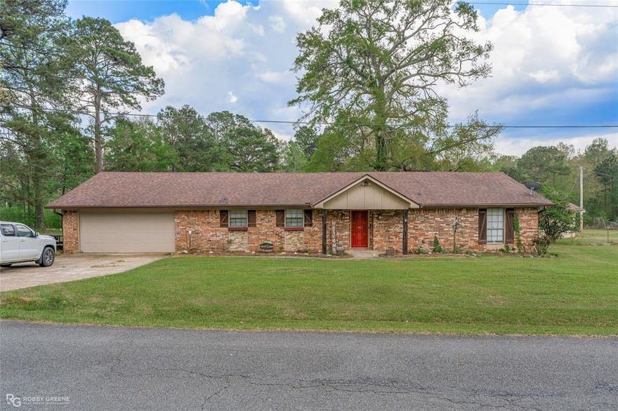 Welcome to this beautiful home located in the highly desirable Benton, Louisiana, offering the perfect blend of space, comfort, and freedom on 3 acres. 

This 3-bedroom, 2-bathroom home features a 2-car garage and a warm, inviting living area centered around a stunning brick fireplace.

Enjoy the character of a sunken living room and an open kitchen designed for both everyday living and entertaining. Step outside to a large back patio—perfect for relaxing or hosting gatherings while taking in the peaceful surroundings.

With no HOA, you’ll have the flexibility to truly make this property your own, and it also offers excellent homestead potential. Energy-efficient solar panels help reduce utility costs.

Don’t miss your opportunity to own a slice of country living with modern conveniences in one of the area’s most sought-after locations!

Call today to schedule a showing!