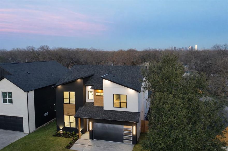 Welcome to this luxurious 4-bedroom, 4-bathroom, 2,950 sqft modern home located 15 minutes West of Downtown Dallas. Nestled in an up and coming community of contemporary new builds, this property offers not only upscale living but also excellent long-term investment potential. The open-concept main living area is perfect for entertaining or relaxing with family, featuring light oak luxury vinyl flooring, a striking electric fireplace, soaring ceilings and a dining space highlighted by elegant modern pendant lighting with a wine rack wall as the center piece. The kitchen is a chef’s dream with stylish cabinetry, sleek hardware, and a spacious walk-in pantry for added convenience. The primary, downstairs with a spa-like master bathroom, large walk-in shower and a relaxing garden tub. The primary suite boasts a walk-in closet with a built-in vanity for her and ample storage—perfect for organizing clothing, shoes, and accessories with ease. The covered back patio is the perfect location to winds down after a long day with entertainment wired in already for an easy plug-n-play. Don’t miss your chance to own this exceptional home that combines luxury, comfort, and prime location. Schedule your private tour today!