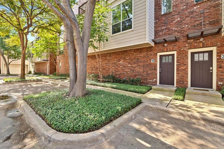 Your lock-and-leave home awaits in Holland Oaks! Just minutes from the airport and Highland Park Village, and within walking distance to Whole Foods, you’ll enjoy quick access to the best dining and shopping in Dallas. Inside, you’ll find wood flooring, recessed lighting, and a gas stovetop. This 2 bed 2.5-bath home offers a spacious primary suite with a step-out balcony, en-suite bath with soaking tub, walk-in shower, double vanities, and a large walk-in closet. The home offers high ceilings, an open layout, and peaceful tree views from the windows. Additional highlights include ample street and front parking, a two-car garage, refrigerator, washer, and dryer that all convey. HOA covers water, trash, gas, and exterior insurance. Schedule your tour today!