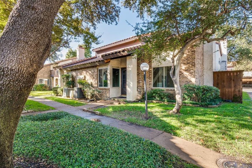 Beautifully refreshed and designed for effortless living, this 2-bed, 2-bath condo blends style and convenience within a gated community featuring a pool. The main level showcases refinished hardwoods, fresh paint, upgraded light fixtures and fans, and an elegantly updated kitchen with new tile, counters, and sink. The sunlit living room with fireplace opens to a private patio, creating a seamless indoor–outdoor experience. Both bedrooms offer the opportunity to serve as the primary suite—choose the first-floor option for easy access or the upstairs retreat for added privacy, complete with updated bath finishes, a private balcony, and a loft ideal for an office, fitness space, or lounge. With exterior maintenance handled by the community and unbeatable access to premier dining, shopping, and major thoroughfares, this lock-and-leave residence delivers low-maintenance luxury in a prime location.