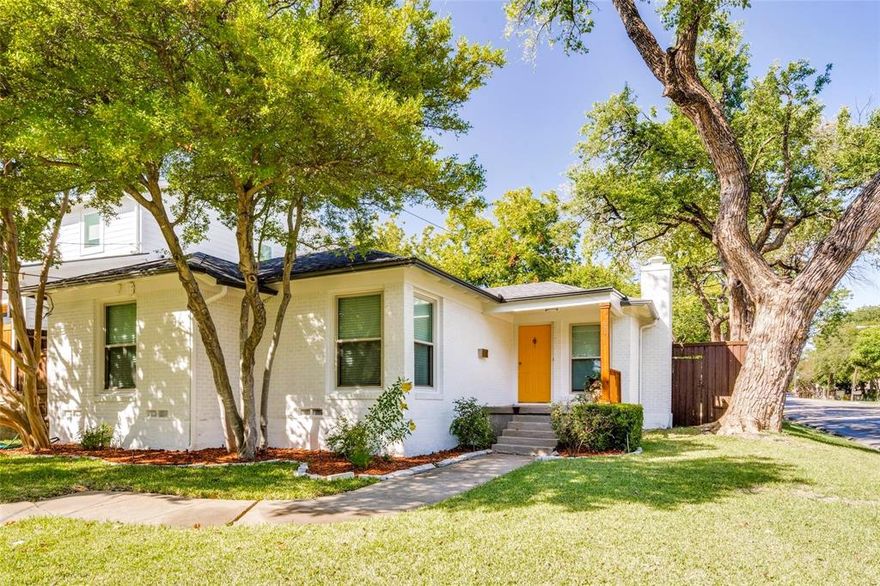 This updated single-story Lakewood area home on the corner of Vanderbilt & Abrams, sits on a huge 50x220 lot & is served by exemplary Mockingbird Elementary school. Conveniently close to Tietze Park, Whole Foods, Lakewood shopping & White Rock Lake, this could be a home site for your new construction dream house, but right now you will discover a modern touch in the updated kitchen & baths, with granite & stainless steel appliances walk-in pantry & re-finished hardwood floors. Generous size rooms with large Primary opening up to a covered deck in the nice backyard. More opportunities for expansion or further renovations. Recent upgrades include a new roof 2023, HVAC 2023 & fresh coat of exterior & interior paint in 2023.  Seller may considering a rate buy down, adding to the appeal of making this charming residence your own. Hard to find 3,2,2car home on a quarter acre LOT in 75214.