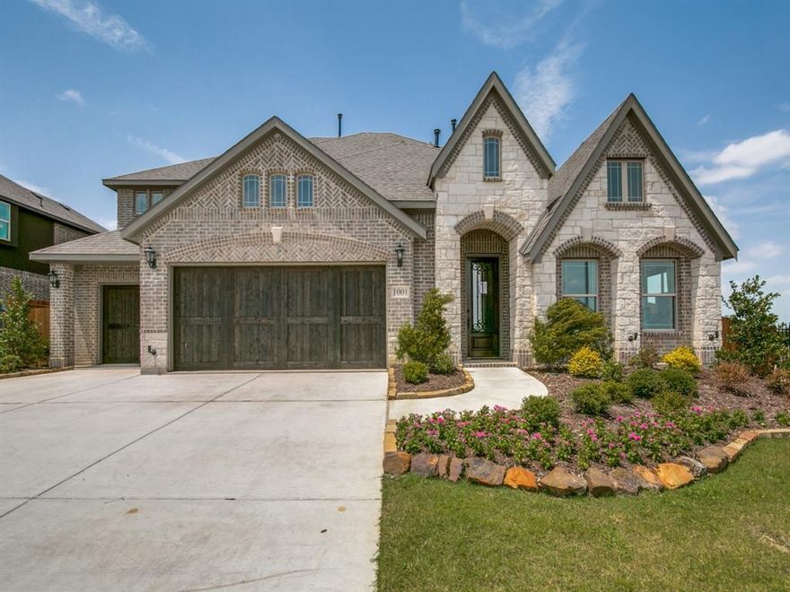 FORMER BLOOMFIELD MODEL FOR SALE! Professionally designed, open-concept model home on a premium corner homesite, with 3 bdrms downstairs & 2 bdrms with ensuite baths upstairs! Formal Dining, Large Study, Powder Room, upstairs Game & Media rooms, and a Covered Patio made for entertaining! Luxury Finishes throughout whole home including Site-finished Wood Flooring, Designer Painted Cabinets, Custom Painted Accent Walls, matching Custom Window Dressings & Window Cushions, elegant Exposed Staircase, and a Gourmet Kitchen with a Built-In Appliance Package. Grand Family Room with soaring ceiling & Stacked Stone Fireplace. Glass French Doors to the Study, Rotunda Foyer, Art Nooks & Arched Doorways, Mud Room Cabinet & Utility Storage. Hardwood continues into the posh Primary Suite on first floor. Also showcases backyard views from a window seat, a deck mount tub, glass shower with seat, and two separate vanities. Don't miss out on this dream home - contact Bloomfield today!