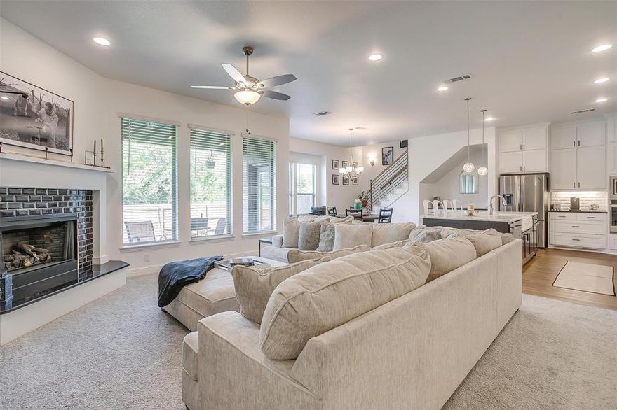 SELLER TO PAY $5,000.00 TOWARDS BUYERS CLOSING COST + TITLE POLICY.  Welcome to this beautifully upgraded 4-bedroom traditional home in the desirable Panchasarp Farms community of Burleson — offering modern smart-home features and flexible living spaces on a premium homesite. Enjoy rare backyard privacy and open views with no homes behind, a standout feature in this growing community and not typically available with new construction. Designed for today’s lifestyles, the spacious floor plan is ideal for multi-generational living, featuring a guest suite on the main level, multiple living areas, and a dedicated study perfect for remote work or quiet retreat. The inviting living room centers around a cozy fireplace, creating a warm gathering space for family and friends. A gourmet kitchen showcases a large island, coffee bar, custom cabinetry, granite countertops, stainless steel appliances, 5-burner gas range and a generous walk-in pantry — perfectly suited for entertaining or everyday living. Builder-upgraded luxury vinyl flooring adds both durability and style to the primary living areas. Technology enhancements include electric vehicle charging plugs in the garage, full pre-wiring for security cameras, and an installed (owned) whole-home security system for added peace of mind. Outdoor living is elevated with permanent exterior lighting, a gas connection on the covered back porch for grilling, and a dedicated gas connection behind the oven for future conversion. The private backyard also features a SMART Wyze sprinkler system and landscape lighting circuit — ideal for creating a relaxing evening atmosphere. Adding long-term value, Joshua ISD has broken ground on a new $53 million elementary school scheduled to open in August 2026, supporting strong community growth. With thoughtful upgrades, flexible living spaces, and enhanced privacy, this move-in-ready home offers an exceptional opportunity in one of Burleson’s most desirable neighborhoods.