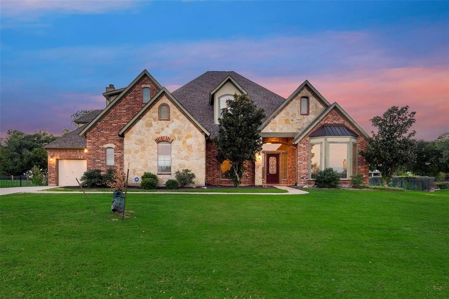 Discover luxury and tranquility in this custom-built home, located in the exclusive gated community of Rose Creek Estates. Situated on a beautiful 1-acre lot, this home blends elegance with comfort and functionality. Step inside to soaring ceilings, a grand staircase, and rich hardwood floors that lead to a sunlit study and formal dining room. Fresh interior paint and brand-new carpet throughout give the home a crisp, move-in-ready feel. The spacious living area showcases a dramatic floor-to-ceiling stone fireplace and offers serene views of the backyard. The gourmet kitchen is a chef’s dream with stainless steel appliances, granite countertops, ample cabinetry, and a cozy breakfast nook. The main-floor primary suite provides a private retreat with direct patio access and a spa-inspired bath with oversized shower, soaking tub, dual sinks, & large walk in closet with built ins. Upstairs features generously sized bedrooms along with a media room and game room, perfect for entertaining or relaxing. Step outside to your own outdoor oasis with a covered patio and beautifully landscaped yard—ideal for gatherings and quiet evenings alike.