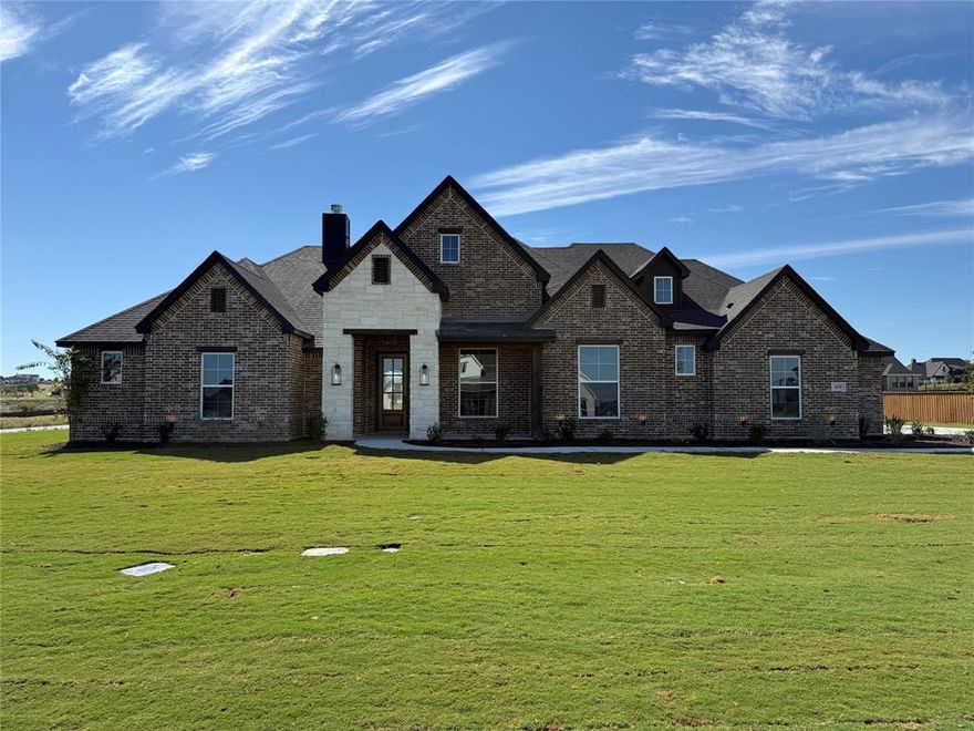 Awesome new plan by Builder in this exclusive new neighborhood in Aledo ISD! Brick and Stone home with black roof, many builder upgrades including Quartz Countertops, Luxury Vinyl flooring throughout all main areas. This home boasts 4 bedrooms, 3 full baths with a huge Covered Patio for entertaining. Plenty of extra room on this 1 acre lot, new construction, Estimated Completion date September 2025, CALL TODAY.