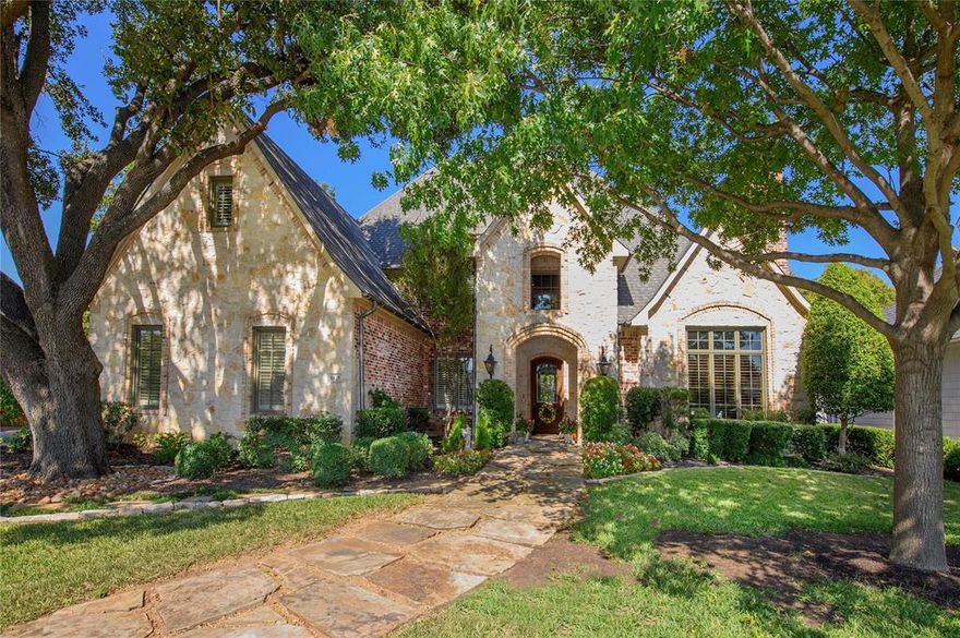 English styled Tudor traditional with lovely landscaping is located on a large lot in coveted Preston Hollow.  Offering a bright, open floor plan, the home has stunning views of from downstairs main living areas to the backyard and pool. Highlights include the open kitchen-family room, spacious primary suite with luxury bath and oversized closet, secondary split bedroom down, three additional bedrooms up with three living areas - game room, ideal for projects, crafts and homework, media and sitting rooms. Quality craftsmanship abounds throughout the home featuring lovely hardwood floors, recessed lighting and oversized windows. Two wet bars, one up, one down, a wine room and a covered patio with an outdoor grill and fireplace add to the entertaining options of the home. Conveniently located near schools, shopping and major medical. A beautiful home inside and out!